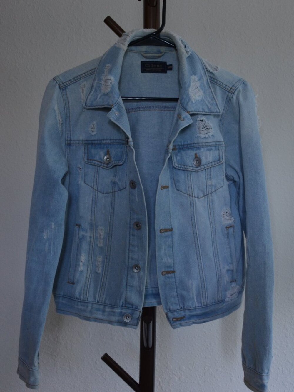 Distressed denim jacket